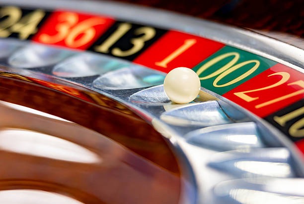 High-limit card game table at cina with premium dealer and studio setup